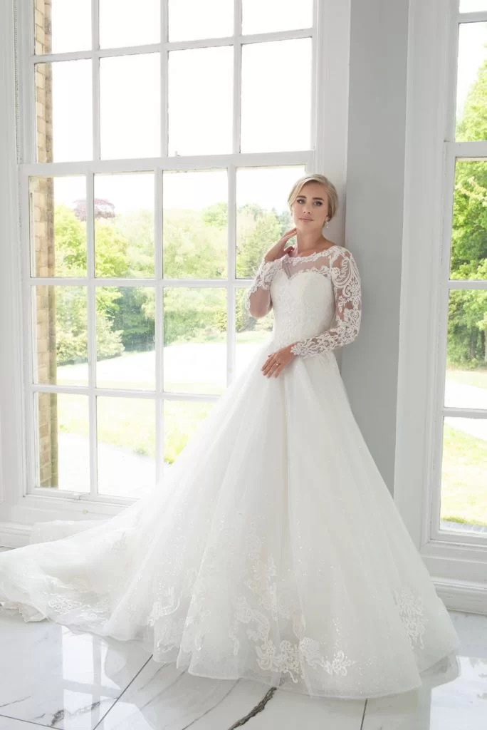 Plunging V-Neck Bridal Gown with Tulle Handkerchief Skirt by Lillian West -  66226
